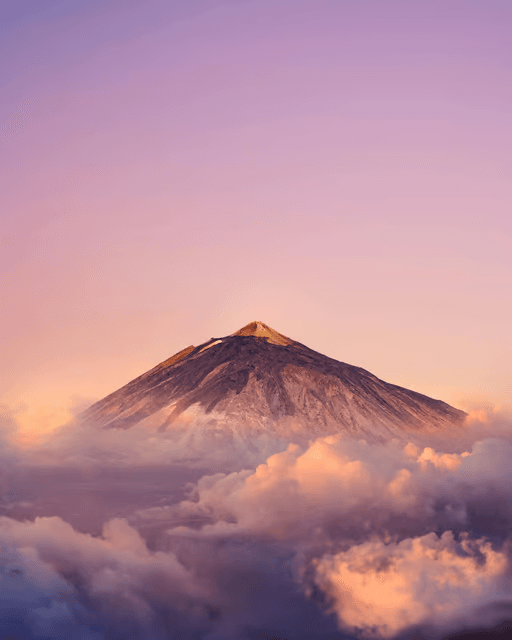 Travel to Tenerife and experience the Teide Sunset Adventure, enjoying a scenic picnic above the clouds with breathtaking views.